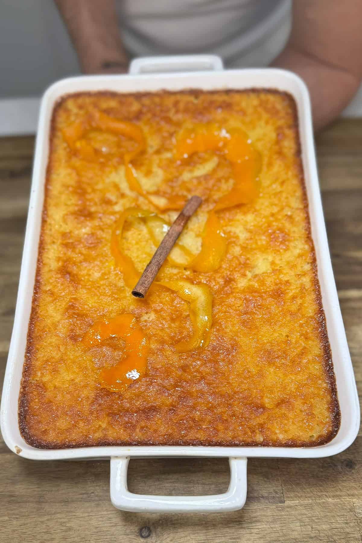 baked portokalopita ready to be sliced and served