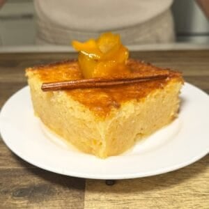 slice of portokalopita on a plate ready to be eaten
