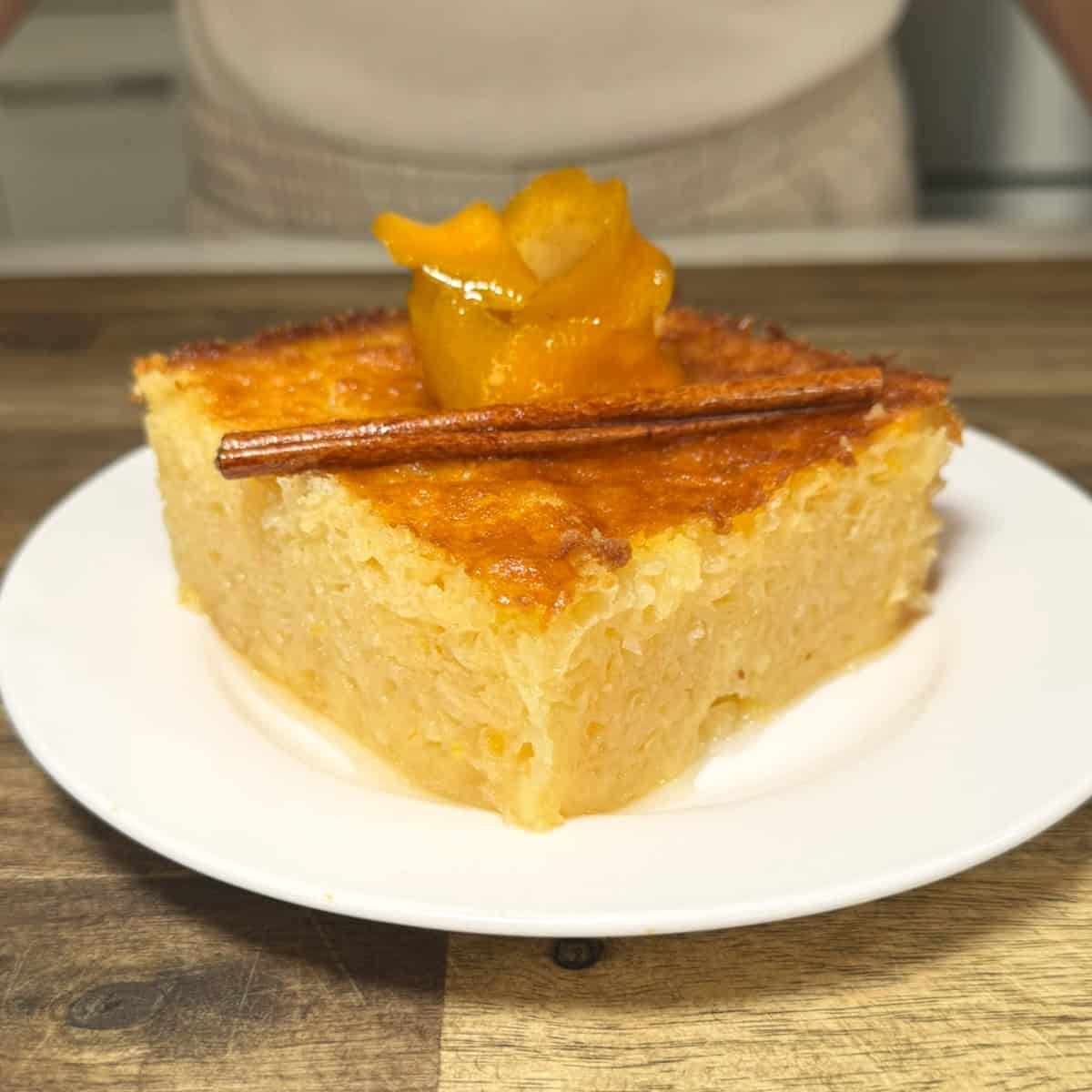 slice of portokalopita on a plate ready to be eaten