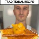 niko holding a slice of portokalopita ready to be eaten
