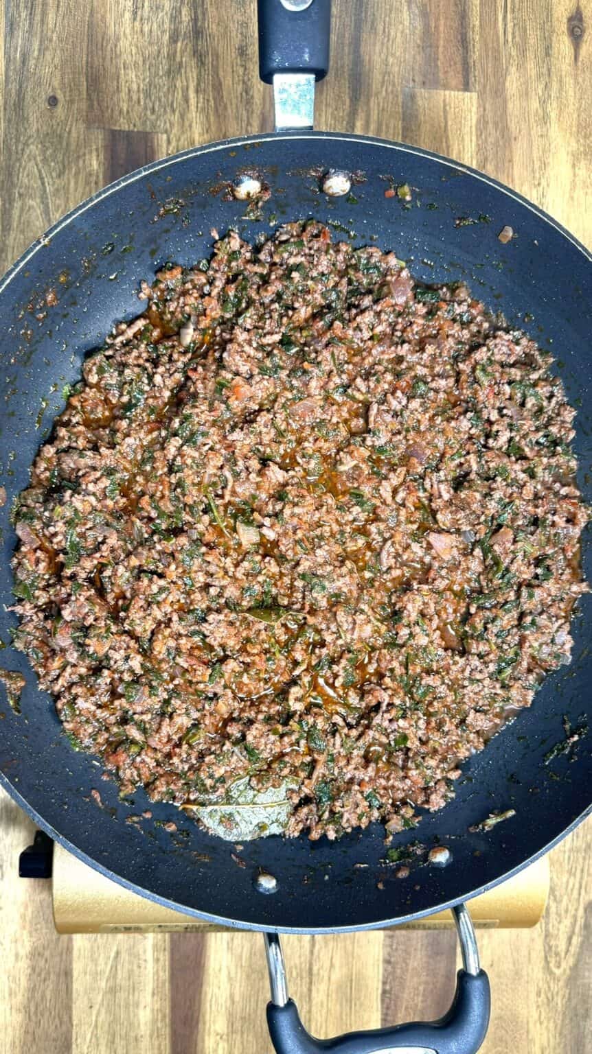 Greek Food Moussaka Recipe meat sauce simmering on the stove