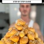 niko holding a stack of loukoumades