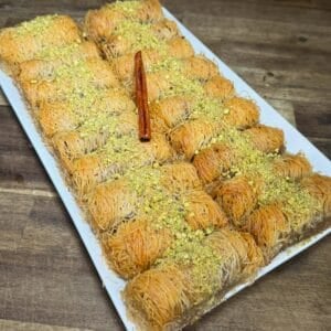 kataifi rolls with nuts on a dish ready for eating