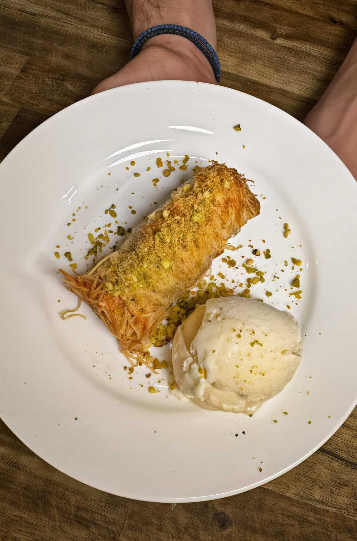 kataifi roll with ice cream on a plate