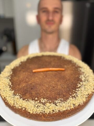niko holding a baked karidopita ready for serving