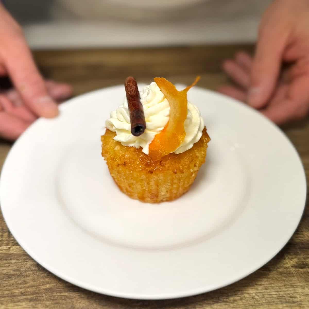 greek orange cupcake on a plate garnished and ready for eating